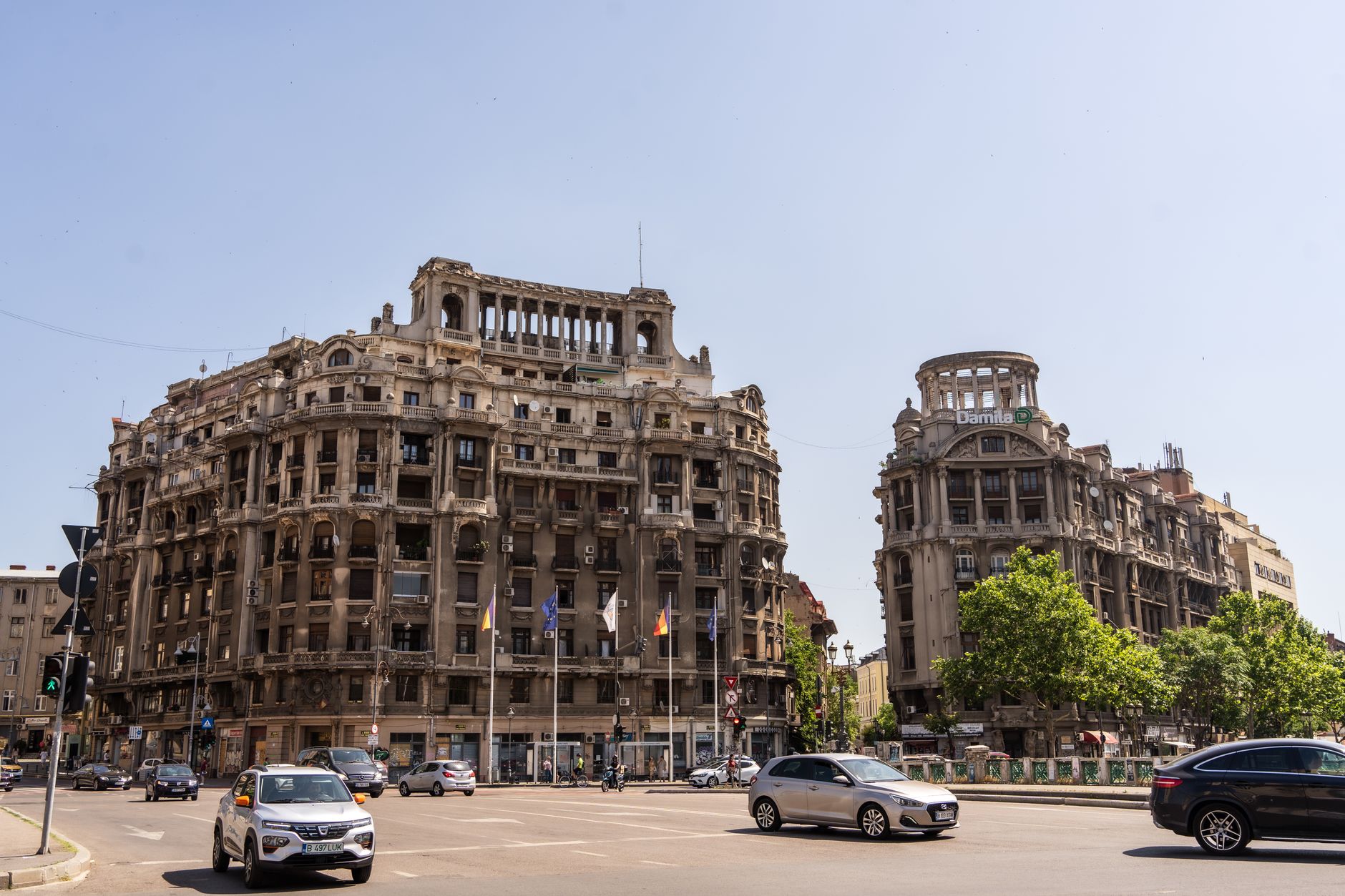 Buildings along a street in Bucharest in daylight.