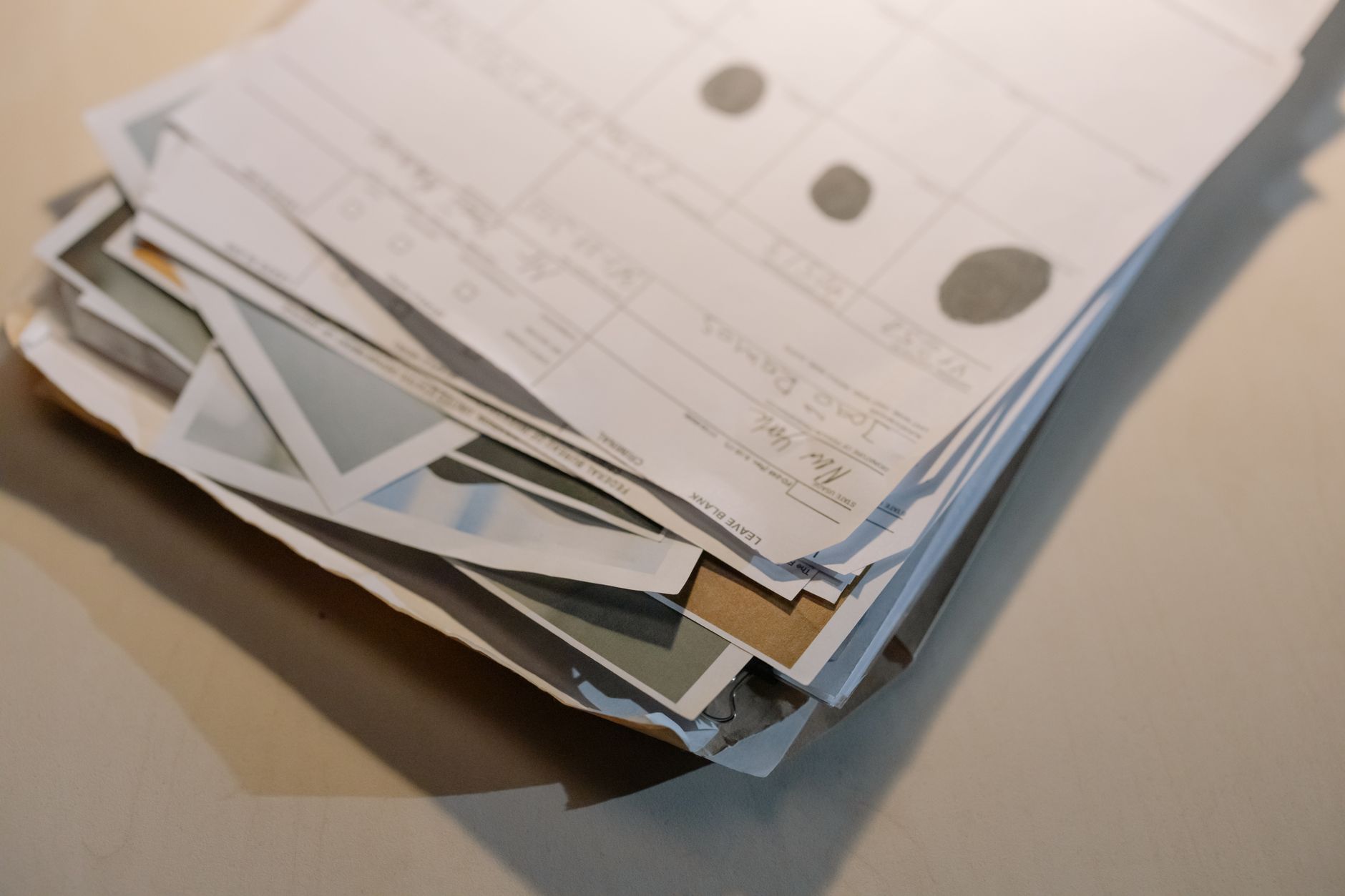 A folder of apostilled corporate documents on a desk, ready for translation