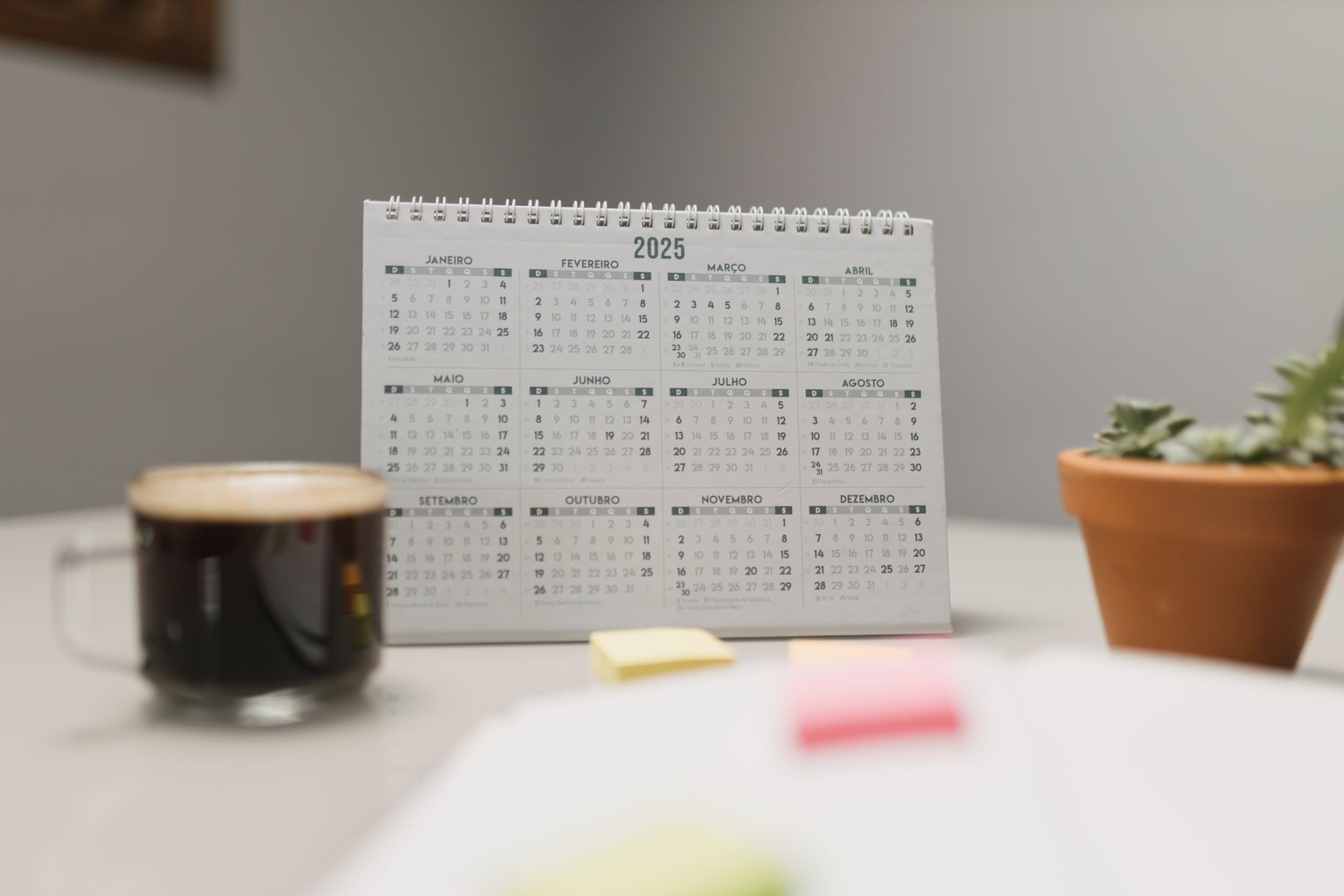 A folder of official documents with a stamp on an office desk.